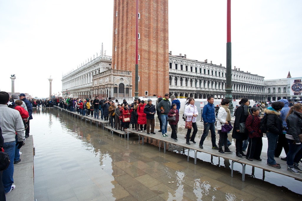 busy bridge over aqua alta